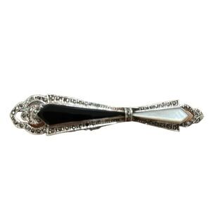 Marcasite vintage sterling silver(925) broach with onyx and mother of pearl.